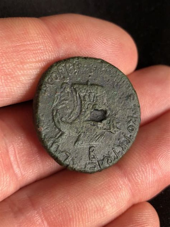 Why are old coins holed?